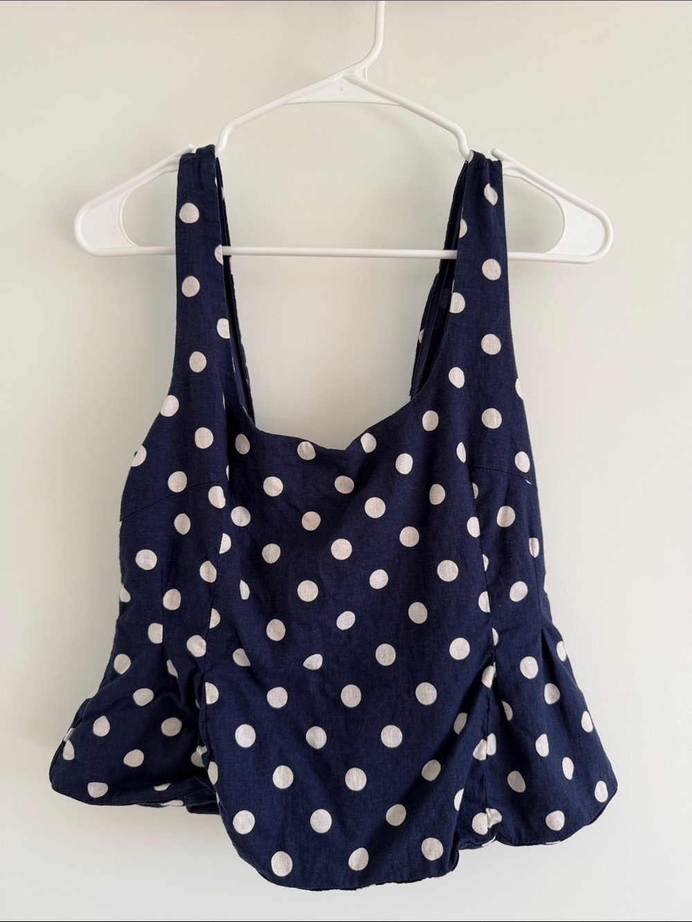 Olivaceous Navy and White Polka Dot Peplum Tank